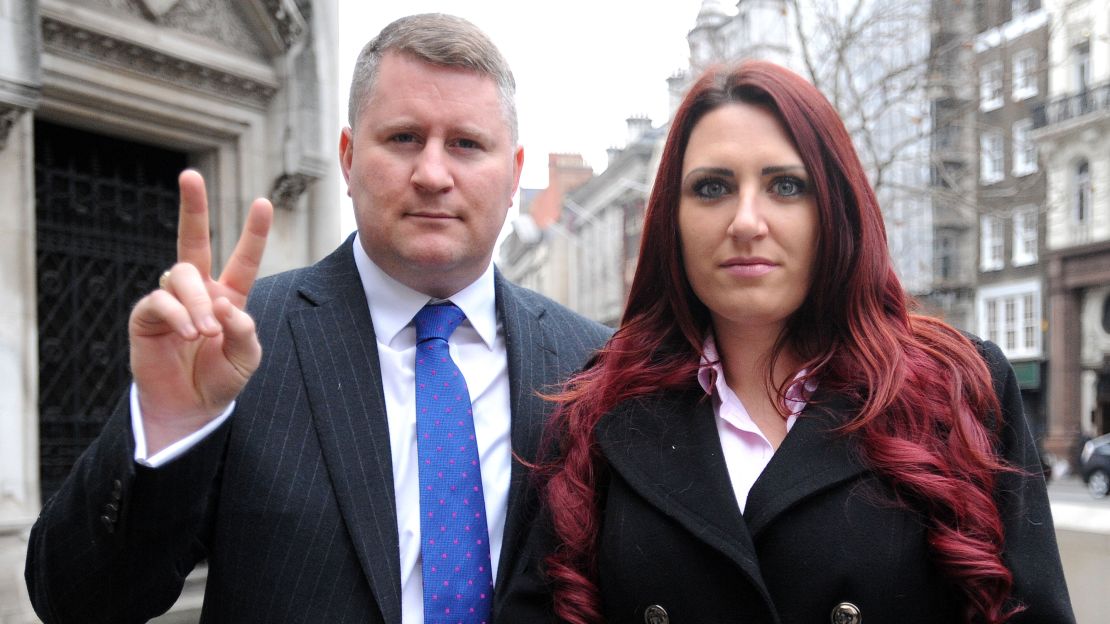 Britain First leader Paul Golding and deputy leader Jayda Fransen arrive at the Royal Courts of Justice in central London.