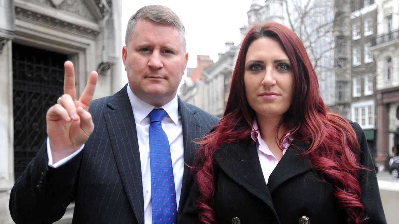 Britain First leader Paul Golding and deputy leader Jayda Fransen arrive at the Royal Courts of Justice in central London.