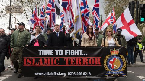 Leaders of Britain First Jayda Fransen, second from right, and Paul Golding, third from left, lead a march in London on April 1, 2017.