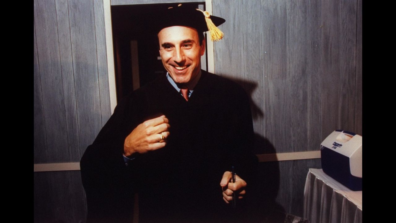 Lauer receives his bachelor's degree from Ohio University in June 1997, eighteen years after he was a student there.