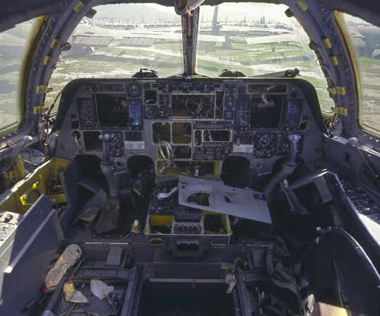 A field of B-52s seen from inside the cockpit of a Rockwell B-1 Lancer, a heavy bomber first produced in 1974.