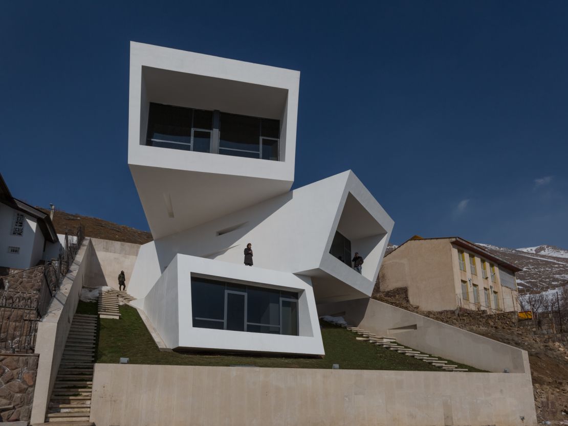 Set in the hills of Tehran, Iran-- this multi-layered build features three volumes stacked on one another.