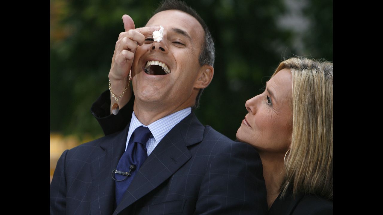 Lauer reacts as his new co-host, Meredith Vieira, smears cake frosting on his nose during her first day on NBC's "Today" show in September 2006.