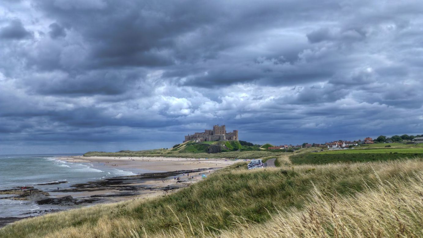 <strong>Bamburgh, Northumberland: </strong>Buffeted by the high waves of the North Sea and loomed over by a vertiginous castle, few places on the coast of Britain can match Bamburgh's eerie atmosphere on a cold winter's day. 