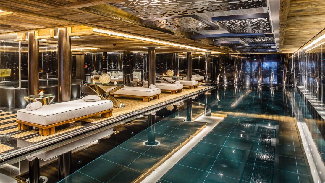 <strong>The spa - Ultima Gstaad, Switzerland:</strong> The spa itself is made from Saharan black marble and has gently running streams of emerald and navy blue-colored water.