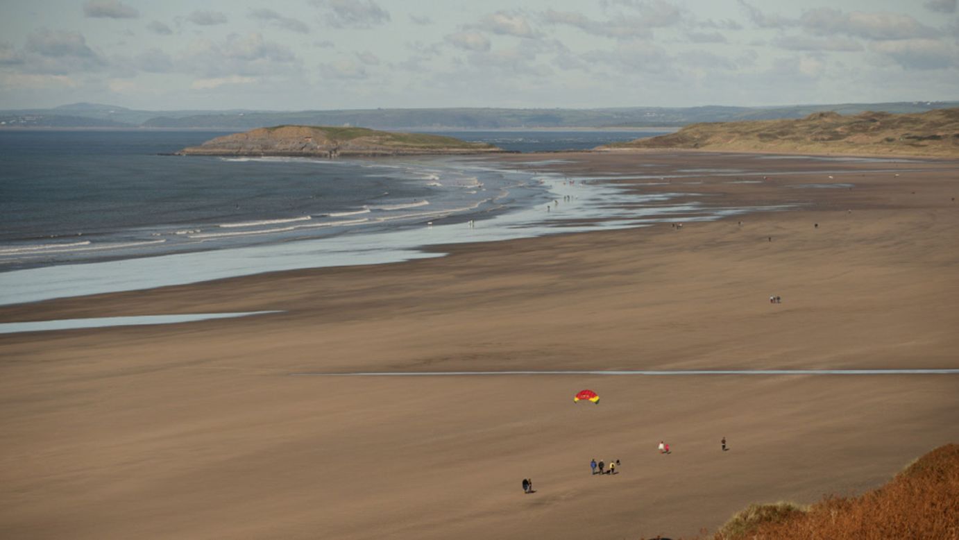 <strong>Rhossili, Wales: </strong>Often described as the most beautiful beach in Wales, Rhossili Bay on the Gower peninsula near Swansea  is as much a winter beach as a summer one. Its three miles of sands make for an easy walk even when the wind is up, the high waves tempting in surfers no matter the weather. 