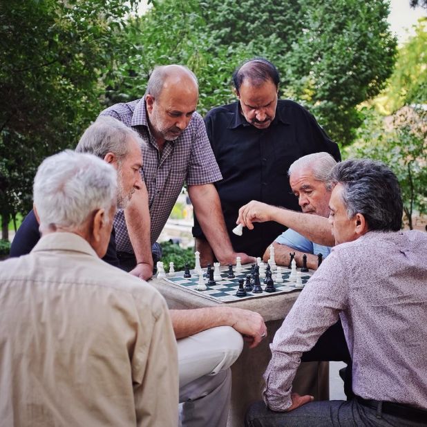Simple, peaceful moments such as this scene of a group of men playing chess in Shariati park in Tehran, Iran, are rarely depicted in the international press, Mackenzie says. 