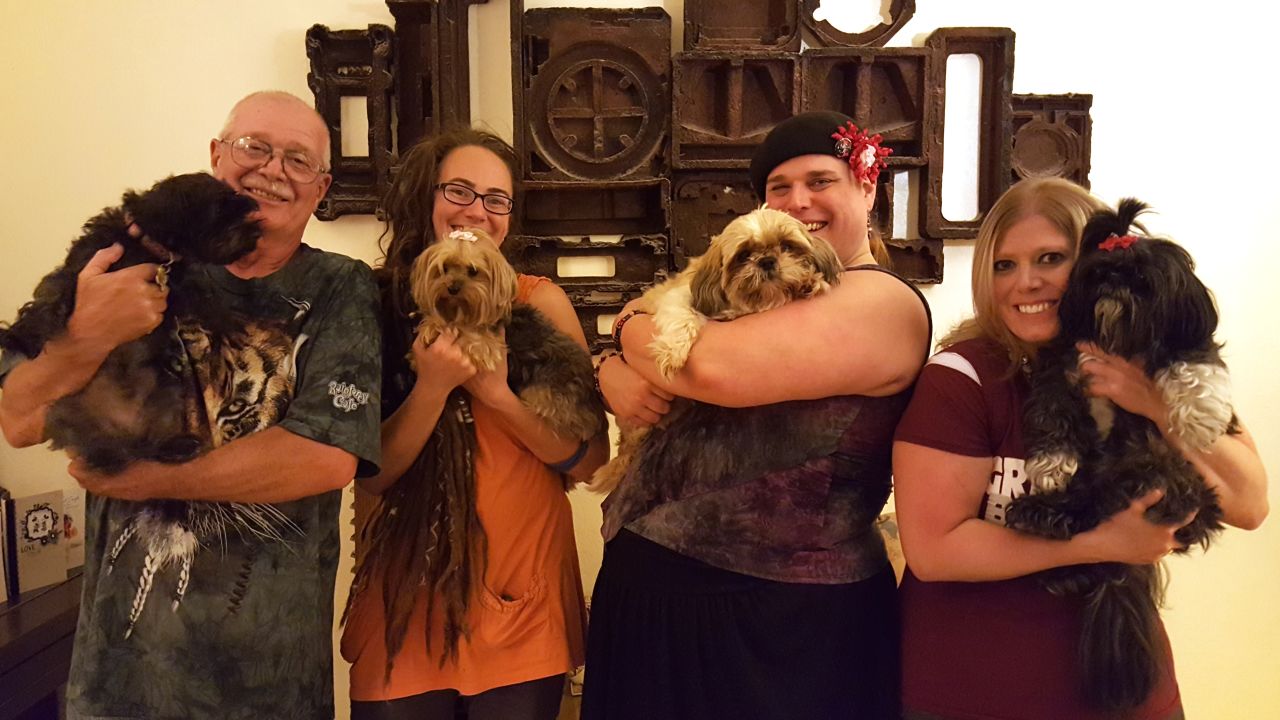 Jasmine Glenn, second from right, lives with her parents and their dogs in Allendale, Michigan.