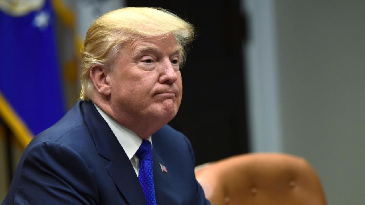 President Donald Trump pauses as the media departs after he spoke in the Roosevelt Room of the White House in Washington, Tuesday, Nov. 28, 2017, during a meeting with Republican congressional leaders. (AP Photo/Susan Walsh)