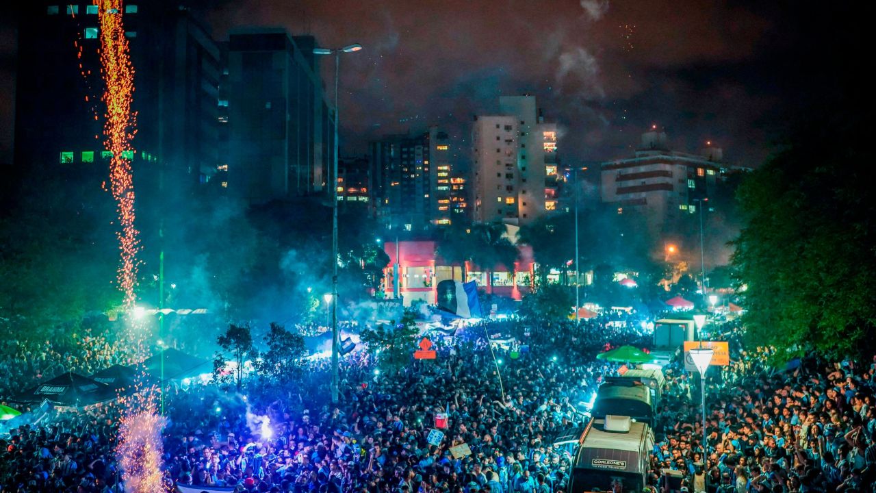 Thousands of Gremio fans line the streets of Porto Alegre to celebrate their team's Copa Libertadores win.