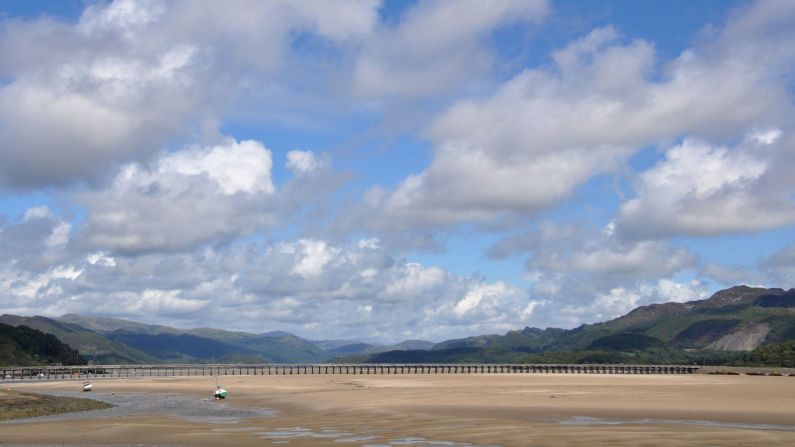 <strong>Barmouth, Wales: </strong>Backed by the glowering mountains of the <a  target="_blank" target="_blank">Snowdonia National Park</a>, Barmouth Sands border the wind-whipped Irish Sea. When the cloud rolls in, there's a moodiness here that's especially acute in winter. 