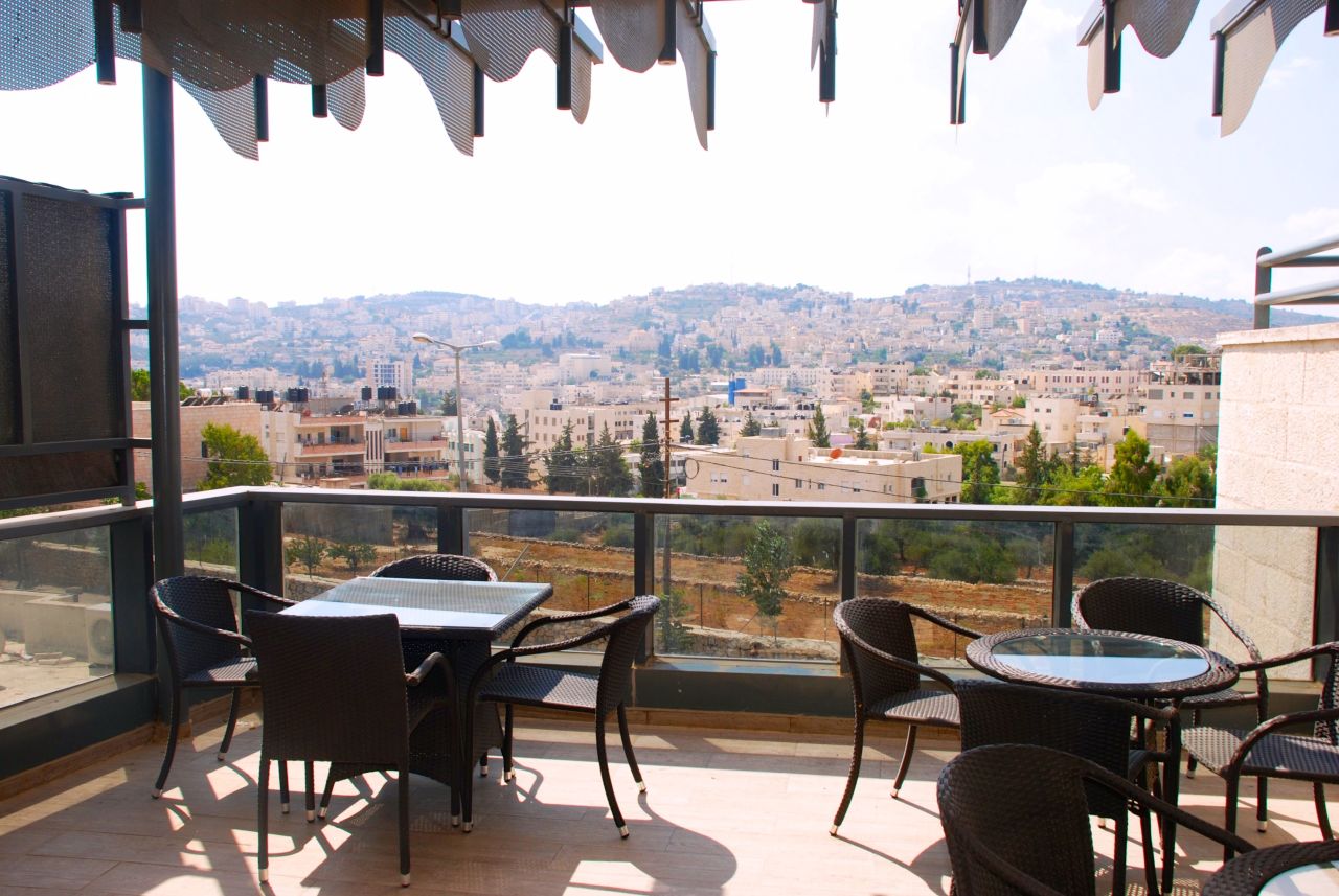 Al Karmeh boasts an airy terrace high above the traffic-choked streets. 