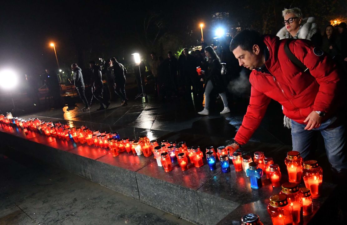 Bosnian Croats and residents of Mostar light candles in tribute to Slobodan Praljak in Mostar on Wednesday.