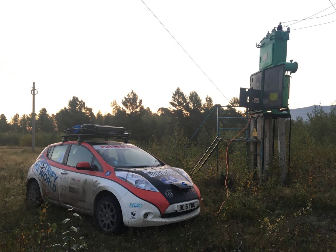 The Ramseys' car hooked to an electricity pylon in Siberia.