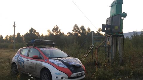 The Ramseys' car hooked to an electricity pylon in Siberia.