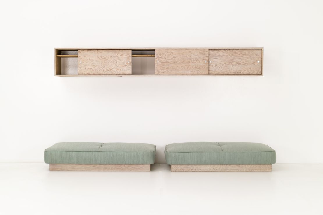 Albert Frey floor cushions and and wall mounted cabinet