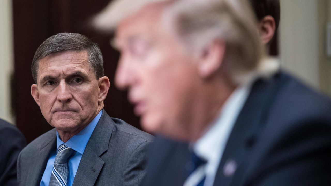 WASHINGTON, DC - JANUARY 31: National Security Adviser Mike Flynn listens to President Trump during a listening session with cyber security experts in the Roosevelt Room the White House in Washington, DC on Tuesday, Jan. 31, 2017. (Photo by Jabin Botsford/The Washington Post via Getty Images)