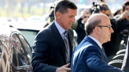 WASHINGTON, DC - DECEMBER 01:  Michael Flynn (L), former national security advisor to President Donald Trump, arrives for his plea hearing at the Prettyman Federal Courthouse December 1, 2017 in Washington, DC. Special Counsel Robert Muller charged Flynn with one count of making a false statement to the FBI.  (Photo by Chip Somodevilla/Getty Images)