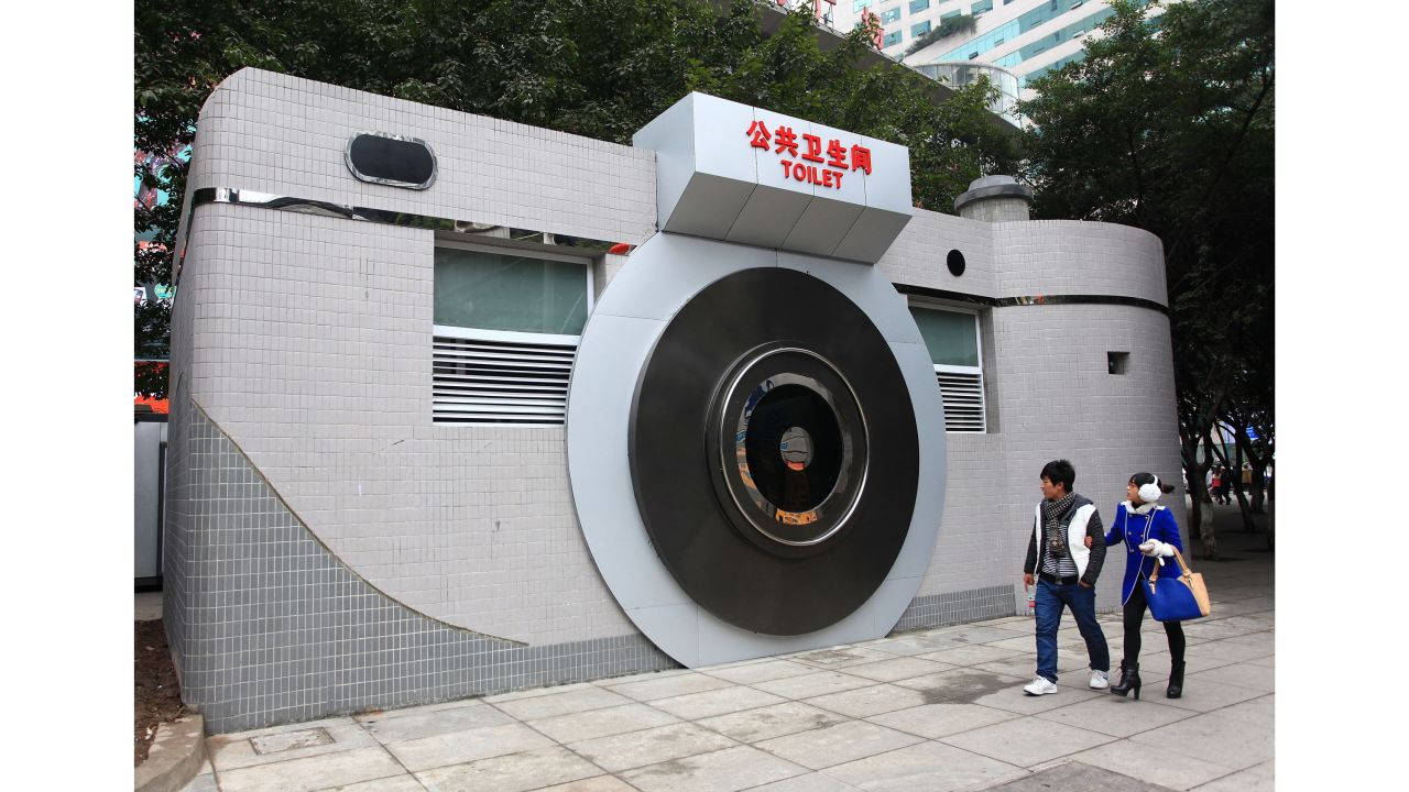 <strong>Cleaning up: </strong>Worried that bad restroom standards are harming tourism and causing poor public hygiene, China is mounting a 'toilet revolution." This camera-shaped public toilet in the city of Chonqging is already turning heads.