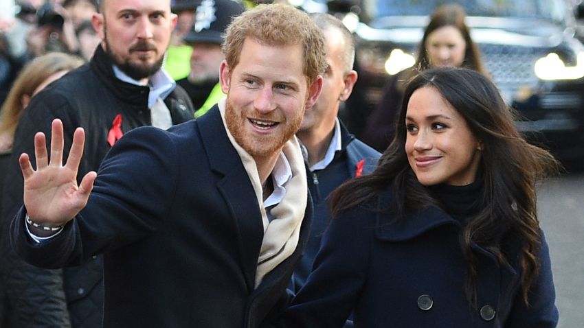 Britain's Prince Harry and his fiancee US actress Meghan Markle greet wellwishers on a walkabout as they arrive for an engagement at Nottingham Contemporary in Nottingham, central England, on December 1, 2017 which is hosting a Terrence Higgins Trust World AIDS Day charity fair.
Prince Harry and Meghan Markle visited Nottingham in their first set of engagements together since announcing their engagement. / AFP PHOTO / Oli SCARFF        (Photo credit should read OLI SCARFF/AFP/Getty Images)