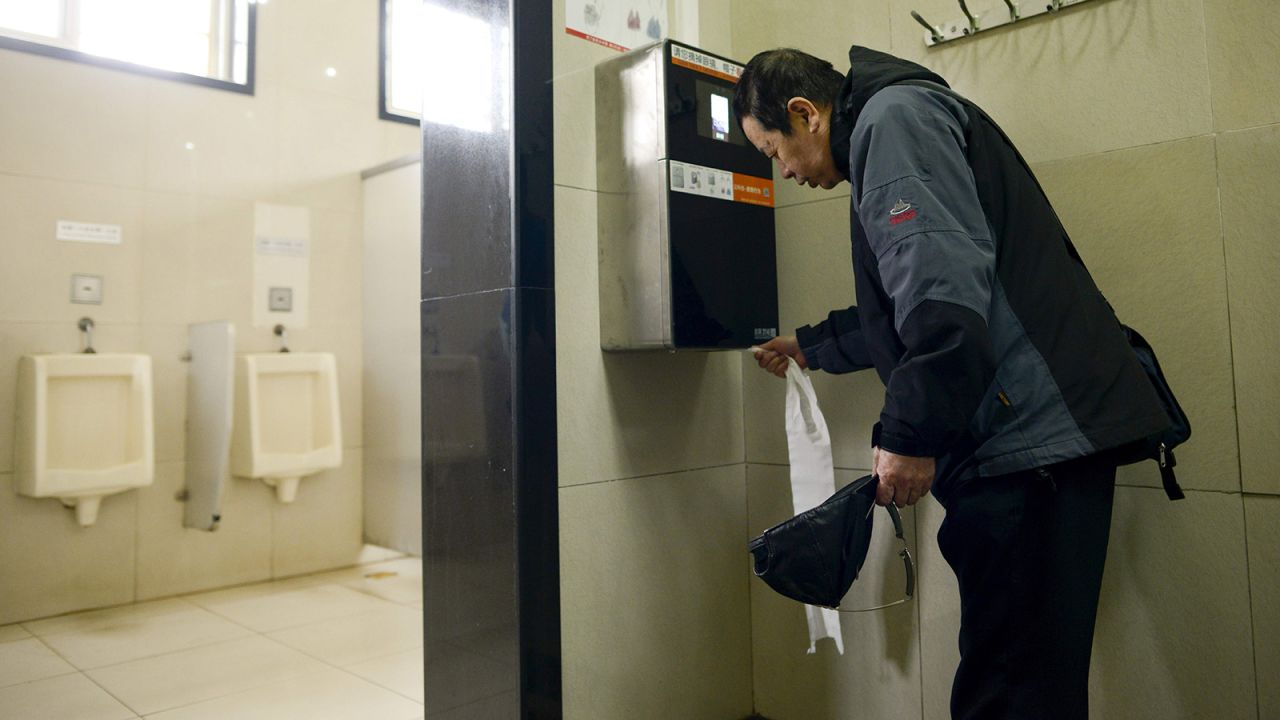 <strong>Flushing in the future: </strong>This modern public toilet at the Temple of Heaven in Beijing has an automatic toilet paper dispenser that uses facial recognition technology. 