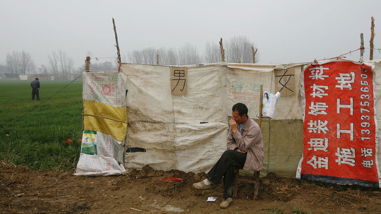 <strong>Smell you later: </strong>This basic pay toilet, photographed in Henan province in 2017, is likely the kind of facility China wants to leave in the past.