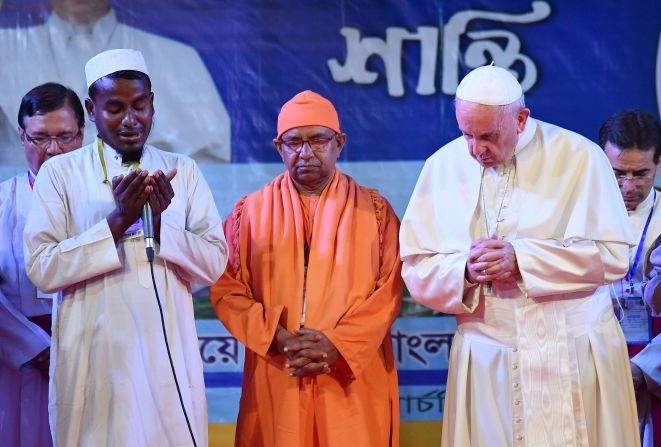 Pope Francis prays with Rohingya refugees during an interfaith peace meeting in the garden of the Archbishop of Dhaka's residence in Bangladesh's capital on Friday, December 1. Francis visited Myanmar and Bangladesh this week, meeting with leaders in both countries to discuss the <a href="http://www.cnn.com/2017/09/13/asia/gallery/rohingya-refugee-crisis/index.html" target="_blank">Rohingya crisis</a>. He <a href="http://www.cnn.com/2017/12/01/asia/pope-bangladesh-myanmar-intl/index.html">referred to Myanmar's persecuted Rohingya Muslim minority by name</a> Friday for the first time during his Asia tour.