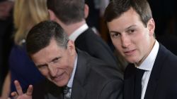 US National Security Advisor Michael Flynn (L) and Jared Kushner, senior White House adviser, wait before a joint press conference between Canada's Prime Minister Justin Trudeau and US President Donald Trump in the East Room of the White House on February 13, 2017 in Washington, DC. 
Flynn, accused of inappropriate contacts with a foreign government and of misleading the US vice president, resigned on February 13, 2017.   / AFP / MANDEL NGAN        (Photo credit should read MANDEL NGAN/AFP/Getty Images)