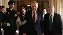 WASHINGTON, DC - DECEMBER 01:  U.S. Senate Minority Leader Sen. Chuck Schumer (D-NY) (2nd R) speaks to members of the media as he walks with Senate Minority Whip Sen. Dick Durbin (D-IL) (R) at the Capitol December 1, 2017 in Washington, DC. Senate GOPs indicate that they have enough votes to pass the tax reform bill.  (Photo by Alex Wong/Getty Images)