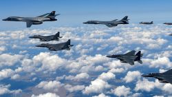 GANGWON-DO, SOUTH KOREA - SEPTEMBER 18:  In this handout image provided by South Korean Defense Ministry, U.S. Air Force B-1B Lancer bombers flying with F-35B fighter jets and South Korean Air Force F-15K fighter jets during a training at the Pilsung Firing Range on September 18, 2017 in Gangwon-do, South Korea. U.S. F-35B stealth jets and B-1B bombers flew near the Military Demarcation Line (MDL) for the first time since recent tension between U.S. and North Korea started raising.  (Photo by South Korean Defense Ministry via Getty Images)