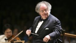 FILE - In this July 7, 2006 file photo, Boston Symphony Orchestra music director James Levine conducts the symphony on its opening night performance at Tanglewood in Lenox., Mass. New York's Metropolitan Opera says it will investigate allegations that its longtime conductor, Levine, sexually abused a teenager in the mid-1980s. Details of the police report were first reported Saturday, Dec. 2, 2017, on the New York Post website. Levine, 74, stepped down as music director of the Met in April 2016.