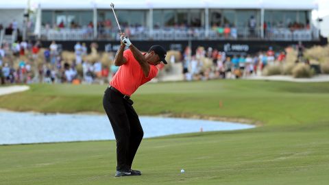 Tiger Woods plays an approach to the 18th green during the final round of the World Hero Challenge.