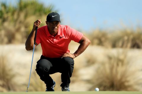 <strong>Pain free:</strong> Able to swing freely and aggressively and appearing to experience no discomfort as he bent down, Woods' comeback at the Hero World Challenge showed promising signs. 