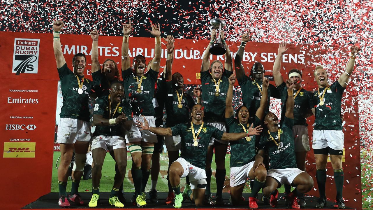 South Africa's rugby sevens team celebrate winning the first leg of the 2018 World Series in Dubai.