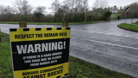 A sign on the Irish border warns of a hard border after Brexit.