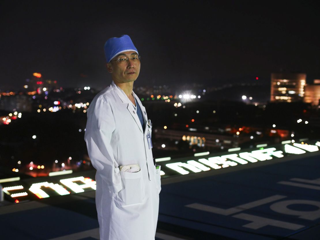 Dr. Lee Cook-Jong on the hospital's rooftop helipad.