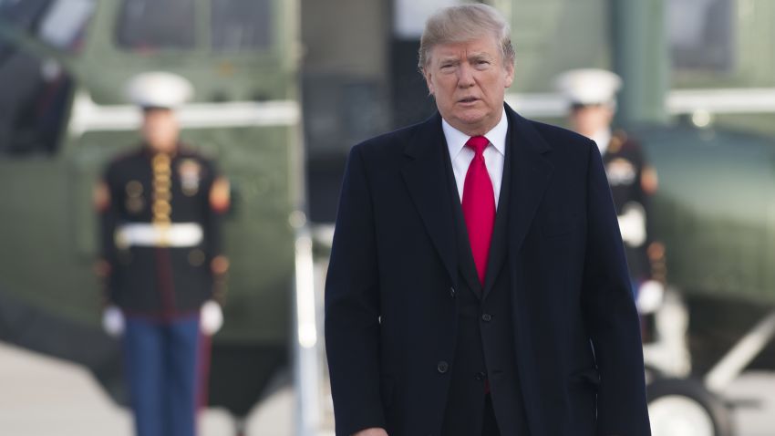 US President Donald Trump walks to Air Force One prior to departure from Andrews Air Force Base in Maryland, December 4, 2017, as Trump travels to Salt Lake City, Utah.