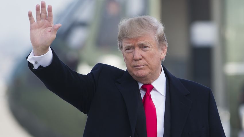 US President Donald Trump walks to Air Force One prior to departure from Andrews Air Force Base in Maryland, December 4, 2017, as Trump travels to Salt Lake City, Utah.