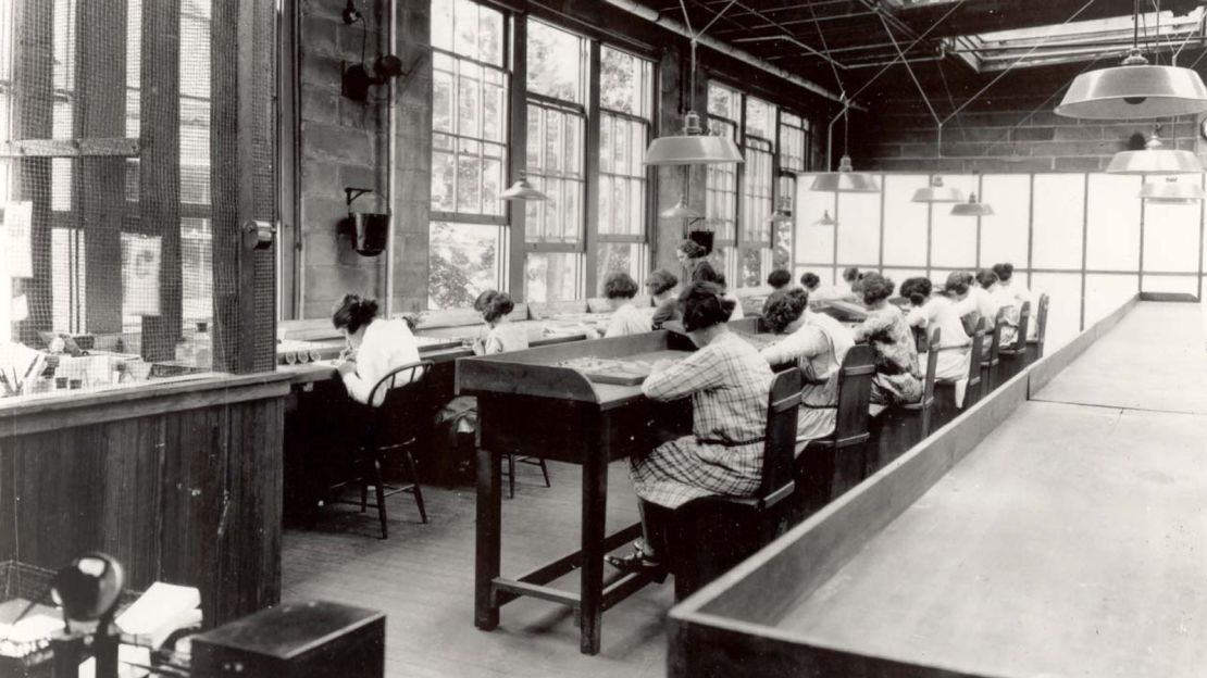 Radium Girls at work in a factory in 1922.