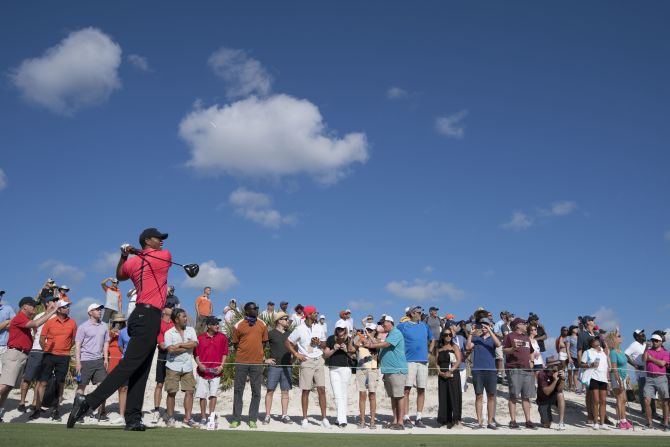 Tiger Woods tees off during the final round of the Hero World Challenge on Sunday, December 3. Woods <a href="index.php?page=&url=http%3A%2F%2Fwww.cnn.com%2F2017%2F12%2F01%2Fsport%2Ftiger-woods-hero-world-challenge-comeback%2Findex.html" target="_blank">finished tied for ninth</a> in the 18-player event, his first competitive tournament in nearly a year. He was making his long-awaited return from a fourth back surgery, and he said his pain-free comeback <a href="index.php?page=&url=http%3A%2F%2Fwww.cnn.com%2F2017%2F12%2F04%2Fgolf%2Ftiger-woods-looking-ahead-to-2018%2Findex.html" target="_blank">has him "excited"</a> for the year ahead.