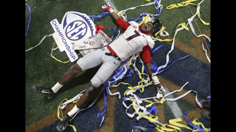 Georgia linebacker Lorenzo Carter celebrates after the Bulldogs defeated Auburn 28-7 to win the SEC title on Saturday, December 2. The next day, Georgia was one of the four teams chosen to play in this season's College Football Playoff.
