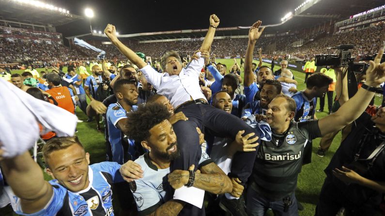 Gremio players carry their coach, Renato Gaucho, after <a href="index.php?page=&url=http%3A%2F%2Fwww.cnn.com%2F2017%2F11%2F30%2Ffootball%2Fcopa-libertadores-final-gremio-beats-lanus%2Findex.html" target="_blank">winning the Copa Libertadores</a> on Wednesday, November 29. The Brazilian soccer club defeated Argentina's Lanus to be crowned the best soccer club in South America.