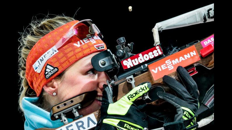 German biathlete Denise Herrmann fires her rifle during a World Cup event in Ostersund, Sweden, on Friday, December 1. She won the 7.5-kilometer sprint competition.