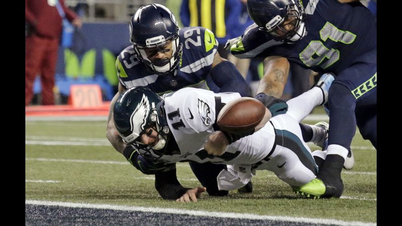 Philadelphia quarterback Carson Wentz fumbles the ball near the goal line during an NFL game in Seattle on Sunday, December 3. Seattle won 24-10, handing the 10-1 Eagles their second loss of the season.