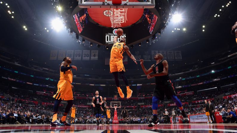 Utah's Donovan Mitchell rises for a dunk during an NBA game in Los Angeles on Thursday, November 30.