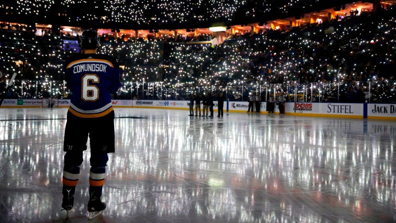Hockey fans in St. Louis use their cell phones to light up the Scottrade Center before an NHL game on Friday, December 1. The pregame ceremony was paying tribute to Ari Dougan, an 11-year-old who recently lost her battle with cancer.