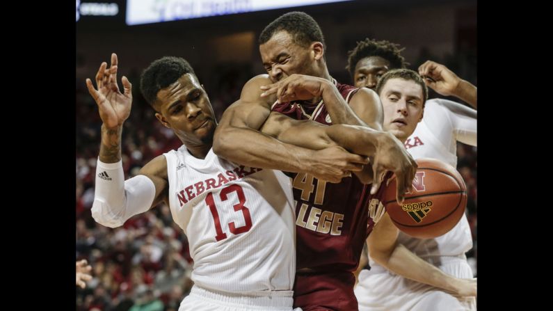 Nebraska's Anton Gill battles for a rebound with Boston College's Steffon Mitchell during a college basketball game on Wednesday, November 29.