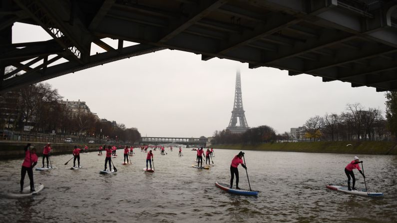 Amateurs and professionals take part in a paddleboard race along the Seine river in Paris on Sunday, December 3. <a href="index.php?page=&url=http%3A%2F%2Fwww.cnn.com%2F2017%2F11%2F27%2Fsport%2Fgallery%2Fwhat-a-shot-sports-1128%2Findex.html" target="_blank">See 23 amazing sports photos from last week</a>