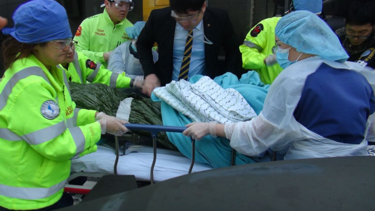 North Korean defector Oh Chong Song being brought to the trauma unit at Ajou University Hospital in the South Korean capital Seoul. on November 13.