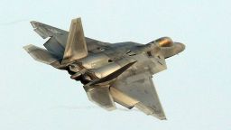 A US Air Force F-22 Raptor stealth jet flies over a South Korean air base in Gwangju on December 4, 2017.
The US and South Korea on December 4 kicked off their largest ever joint air exercise, an operation North Korea has labelled an "all-out provocation", days after Pyongyang fired its most powerful intercontinental ballistic missile. / AFP PHOTO / YONHAP / - /  - South Korea OUT / NO ARCHIVES -  RESTRICTED TO SUBSCRIPTION USE-/AFP/Getty Image